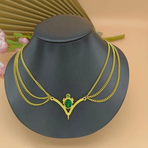 Golden multi-layer bridal hair chain with green gemstone pendants in bohemian style