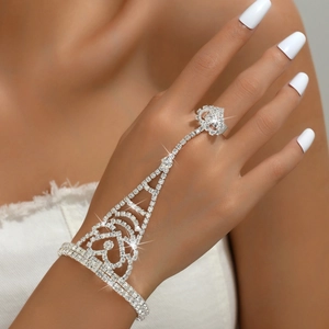 Sparkling silver slave bracelet with rhinestone heart filigree and finger ring for women