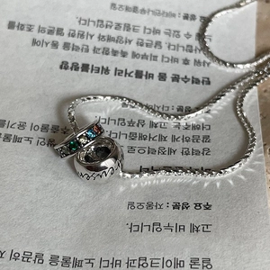 Detail of S925 silver snake chain with rainbow gemstone double ring pendant necklace