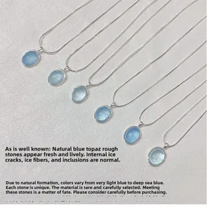 Detailed view of six oval natural aquamarine necklaces showing a blue color gradient