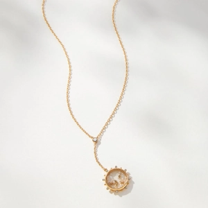 Collier locket en Y doré avec pendentifs lune et étoile sertis de zircons fins