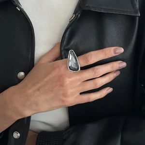 Chunky silver metal ring with a large faceted grey waterdrop acrylic gemstone