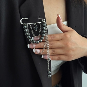 Gothic heart gemstone tassel brooch pin with black beaded chains on black blazer