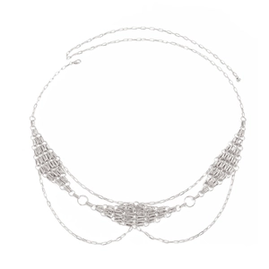 Detailed macro view of silver multi-layered metal waist chain with rhombus mesh weave plates