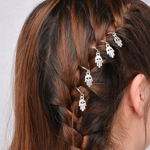 Five pieces of silver Hamsa Hand hair rings with Evil Eye charms for braided hairstyles