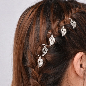 Five vintage silver leaf pendants for hip hop dreadlocks and hair braids on brown hair