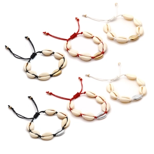 Set of six handmade Hawaiian shell bracelets with adjustable braided cords in three colors