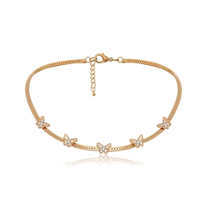 Detail of gold butterfly choker with five pavé rhinestone charms on herringbone chain