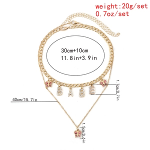 Detailed size chart for layered gold butterfly choker and babe pendant necklace