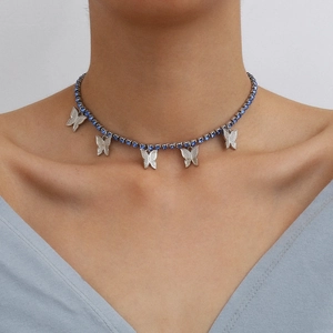 Detailed view of silver butterfly choker necklace with sparkling blue rhinestones