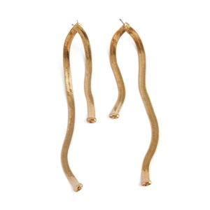 Detailed view of long gold snake chain drop earrings with a sleek metallic finish