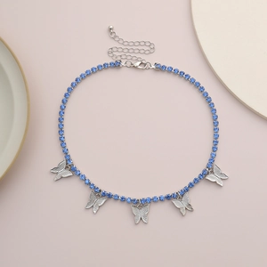 Detail of blue rhinestone necklace featuring five silver butterflies with adjustable chain