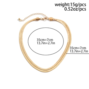 Close-up of double layer gold snake chain with lobster clasp and size weight details