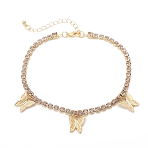 Detail of gold butterfly necklace featuring smokey grey rhinestones and lobster clasp closure