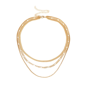 Detail of layered gold snake and figaro chains with adjustable lobster clasp closure