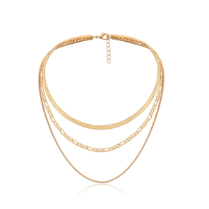 Close-up of three-layer gold necklace featuring snake, Figaro, and link chains with a clasp
