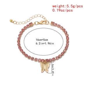 Close-up of gold butterfly necklace with pink rhinestones, 16cm+5cm chain and lobster clasp