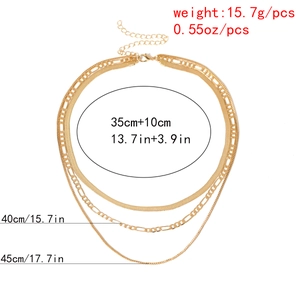 Detailed view of triple-layered golden snake and figaro chain with length dimensions