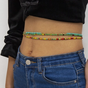 Detail shot of multi-layered bohemian seed bead waist chains in vibrant colors
