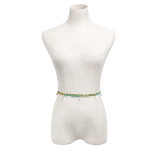 Detail of bohemian waist chain with multi-color beads and natural seashell charms