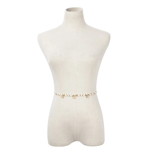 Detail view of double-layer beaded waist chain with delicate golden butterfly charms