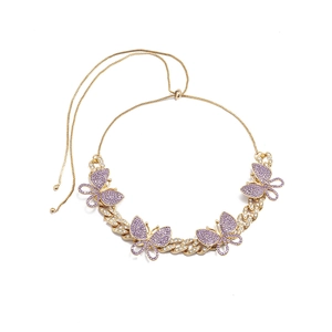 Golden Cuban chain necklace featuring four purple butterfly pendants and adjustable bolo closure