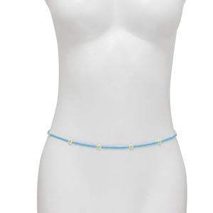 Close-up of bohemian light blue waist chain featuring delicate white daisy bead charms