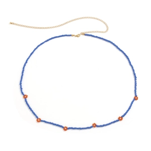 Detail of blue bead waist chain with orange flower charms and golden lobster clasp