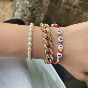 Three-piece layered bracelet set with pearls, rhinestones Cuban chain, and BABY beads