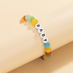 Bracciale elastico con perline occhio di gatto colorate e lettere BABY in acrilico