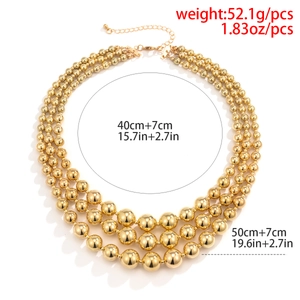 Detail of chunky gold triple-strand bead necklace with size and weight specifications