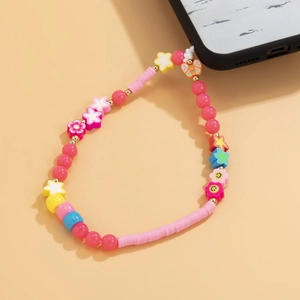 Detail of colorful macaron beaded phone strap with acrylic flowers and smiling faces
