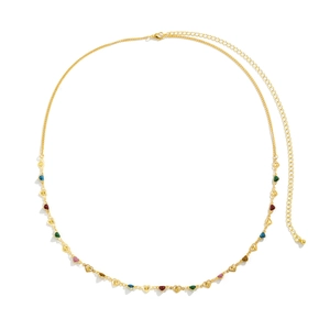 Minimalist gold body chain with heart charms and colorful beads on a white background