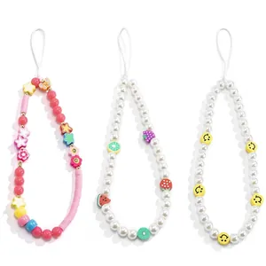 Colorful macaron beaded phone straps with fruits, smiley faces and floral charms