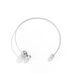 Polished silver metal collar necklace with asymmetrical faux pearl bead details