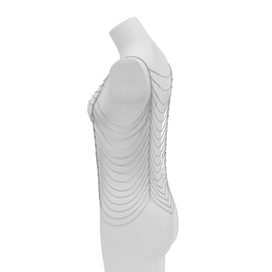 Detailed macro view of multilayer silver body chain with intricate fringe mesh design
