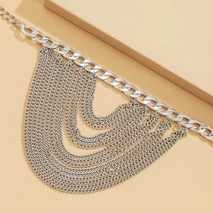 Macro view of multi-layered silver tassel chain with polished metallic geometric details