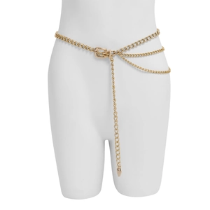 Detail of multi-layered golden metal chain belt with stylish buckle on model