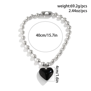 Detail view of heart pendant necklace with 40cm silver bead chain and 4cm heart size