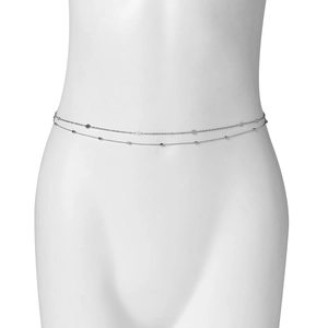 Detail view of double-layered silver waist chain with delicate floral and bead pendants