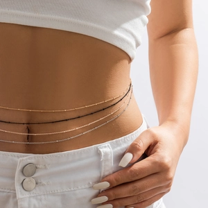 Set of four minimalist waist chains in gold, black, rose gold and silver colors