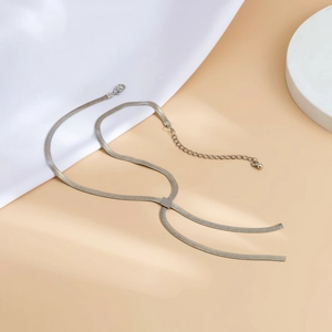 Detailed silver snake bone chain necklace with lobster clasp and adjustable extension link