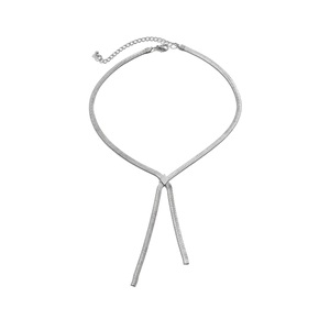 Detail of silver snake chain necklace featuring a diamond-shaped slider and lobster clasp