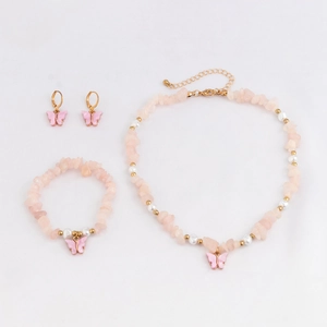 Set collana e bracciale con farfalla in pietra rosa, perle e dettagli oro