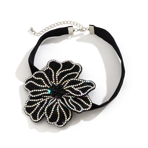 Detail of black floral choker with sparkling rhinestones and adjustable lobster clasp