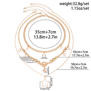 Detailed view of layered gold star pendant necklaces with size and weight specifications