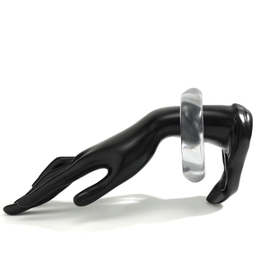 Close-up of clear acrylic chunky bangle displayed on a black hand model fixture
