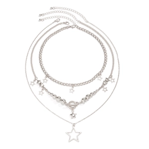 Close-up of silver triple-layer necklace set with star charms and OT buckle on white background
