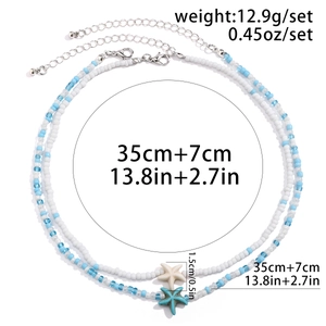 Detail showing two ocean style beaded necklaces with starfish pendants and measurements