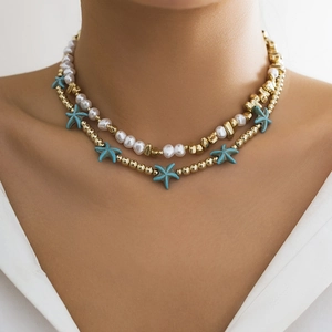 Bohemian beach style layered necklace with turquoise starfish and white pearls